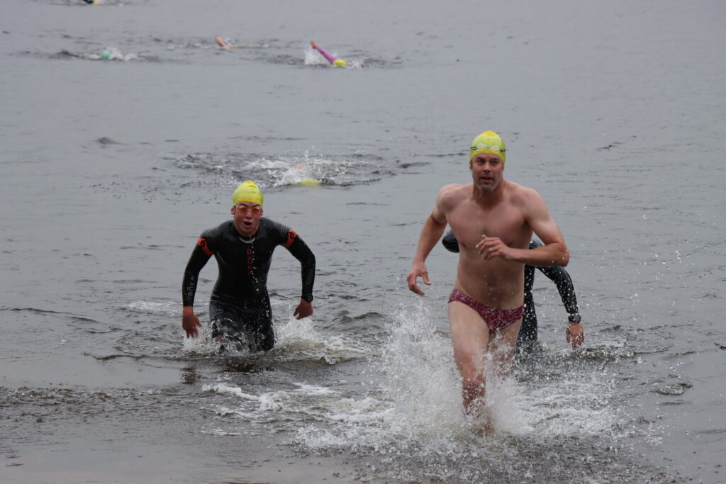 swimmer running out of water