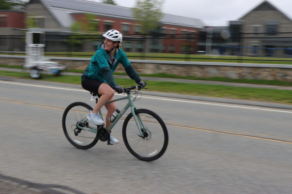 female biker looking backwards